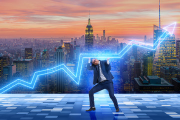 Businessman supporting increase in economy