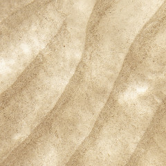 Sandy bottom. Underwater dunes of coral sand. Sand beach sea shells background. View from above 