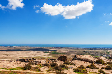 Caspian coast with a lot of oil rigs at sea