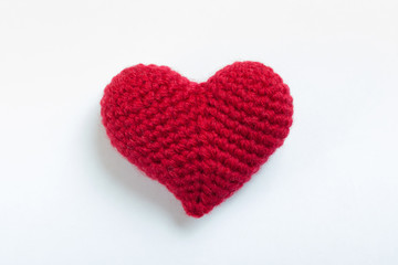 Crochet hearts on white background. Valentine's Day. Symbol of love.