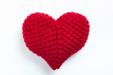 Crochet hearts on white background. Valentine's Day. Symbol of love.
