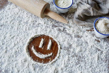 happy smiley in flour