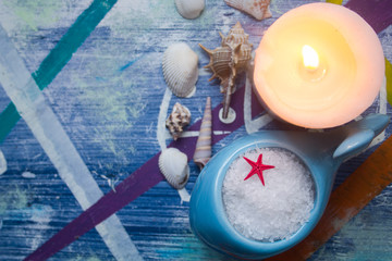 Spa concept. Seashells , candles and  sea salt