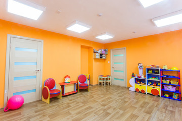 Orange game room in the kindergarten