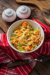 Salad with leek, carrots and apples.