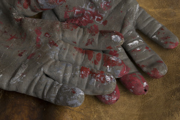 workers gloves in a leather background