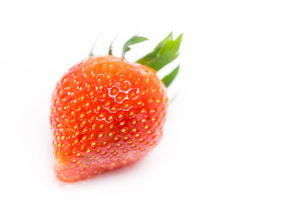 Closeup of fresh strawberry isolated on white background