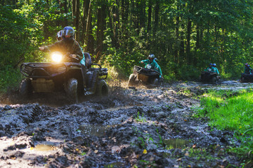 Summer Activities for adults - a trip on quad bikes on the dirty road. 