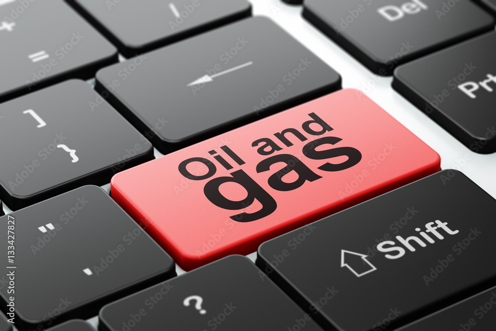 Aufkleber manufacuring concept: oil and gas on computer keyboard background