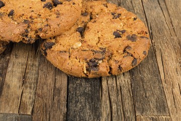 Oatmeal cookies on wooden background. Macro shot.