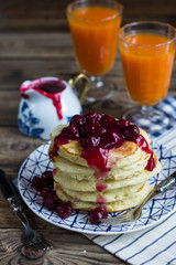 Delicious pancakes with cherry jam