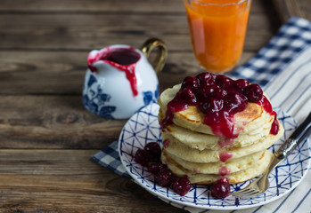 Delicious pancakes with cherry jam