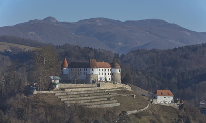 Castle Sevnica with mountain Bohor in background, Slovenia