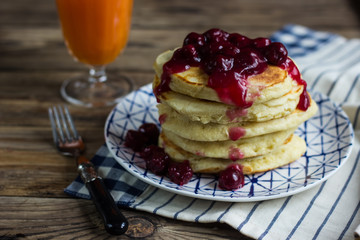 Delicious pancakes with cherry jam