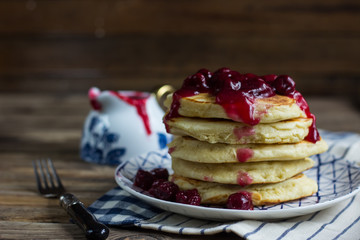 Delicious pancakes with cherry jam