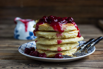 Delicious pancakes with cherry jam