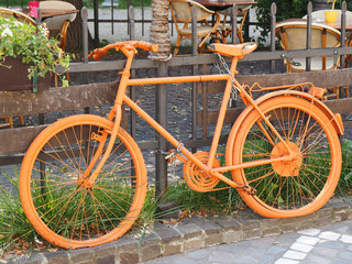 Fototapeta na wymiar old orange bike