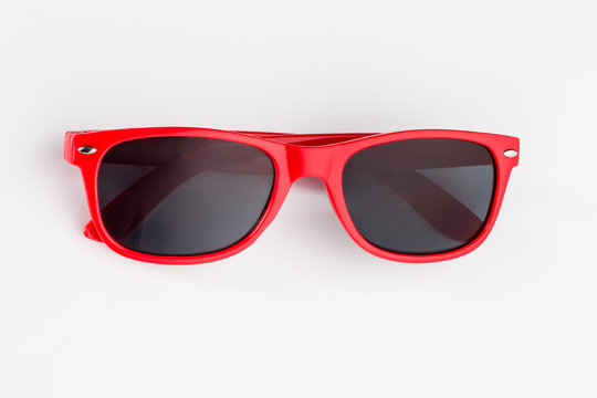 Modern sunglasses isolated on white background with copy space. Product photograph with room for text.
