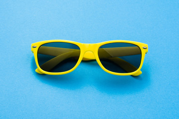 Modern sunglasses on colorful background with copy space. Product photograph with room for text.