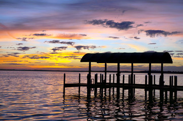 Fototapeta na wymiar Sunset over fishing dock