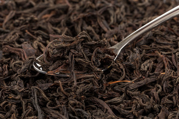 Black tea in a spoon