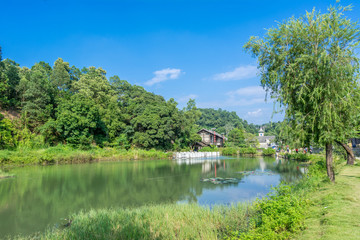 Fototapeta premium Traditional Chinese old buildings and lake at Hakka Village in Shenzhen city, China