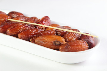 dates isolated on white background. healthy eating vegetarianism