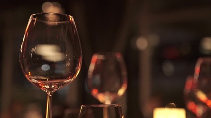 glass of wine restaurant interior serving dinner.