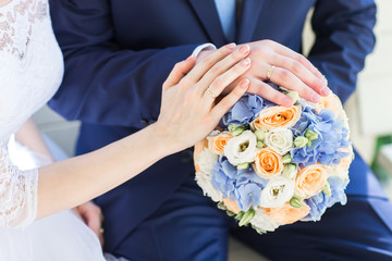 hands with wedding rings