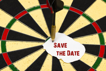 Save the Date. Darts with dart which was pinned a sheet of paper
