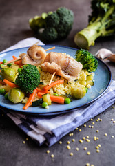 Roasted cod rolls with millet and steamed vegetable