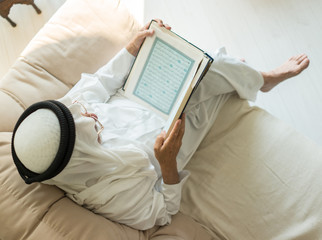 Senior man reading book