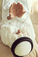 Elderly Muslim Arabic man praying