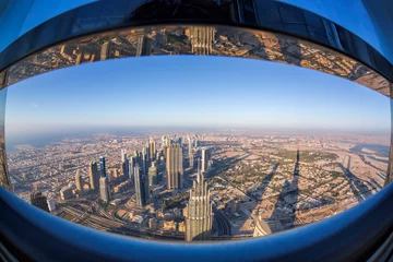 Foto auf Glas Dubai skyline with futuristic architecture by fisheye, United Arab Emirates © Tomas Marek