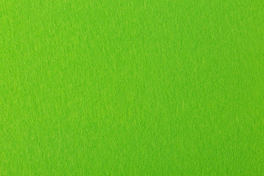 High resolution close up of lime-yellow felt.