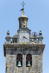 Steeple detail with clock in Viseu, Portugal