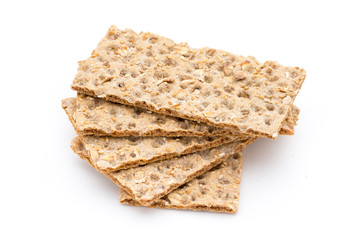 Stack of wholegrain crispy bread with sunflower, chia and sesame