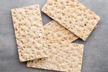 Stack of wholegrain crispy bread with sunflower, chia and sesame