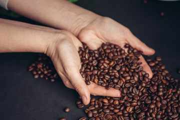 coffee beans in hand