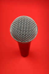 Microphone high angle close up over red