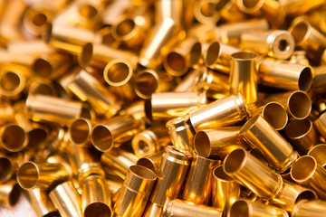 Clean and shiny 9mm brass foreground in focus
