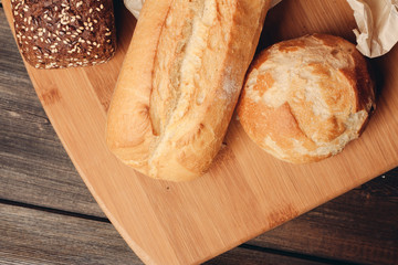 baguette bread loaf on the board