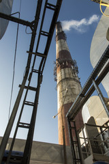 tall chimney and fragments of dust collectors