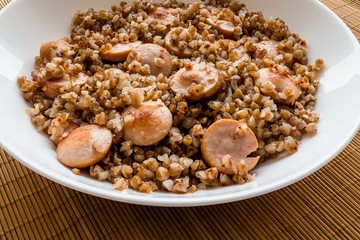 Buckwheat porridge with sausages