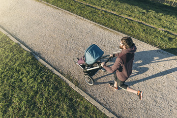 Father playing with his son in the park.