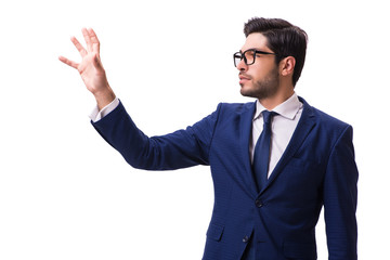 Young businessman pressing virtual buttons isolated on white