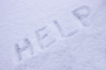 Inscription help on white snow