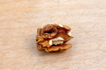 organic walnut on a wood background