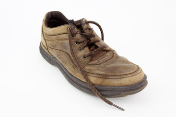 Old brown shoe. Isolated.