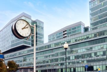 Fototapeta na wymiar Town Clock business building background